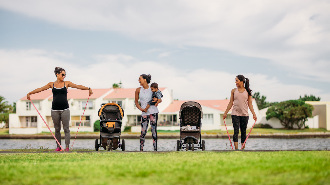 ladies exercising beside buggies